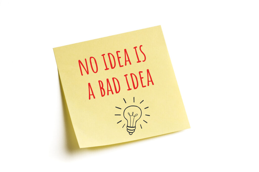 A post-it note with the words 'no idea is a bad idea'